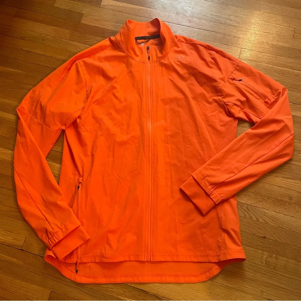 ADIDAS “supernova” lightweight running zip up jacket /orange w/reflective thread